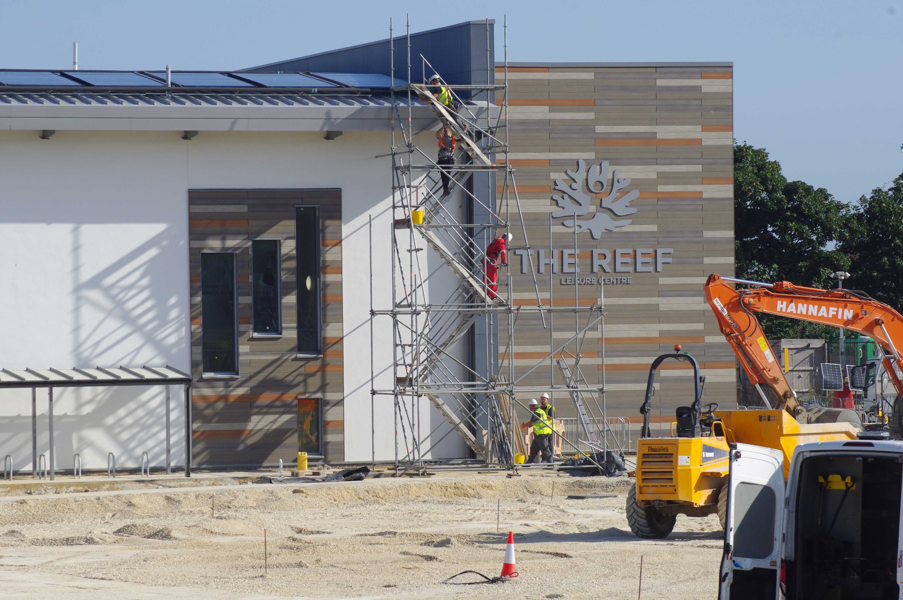 Workers on site at The Reef