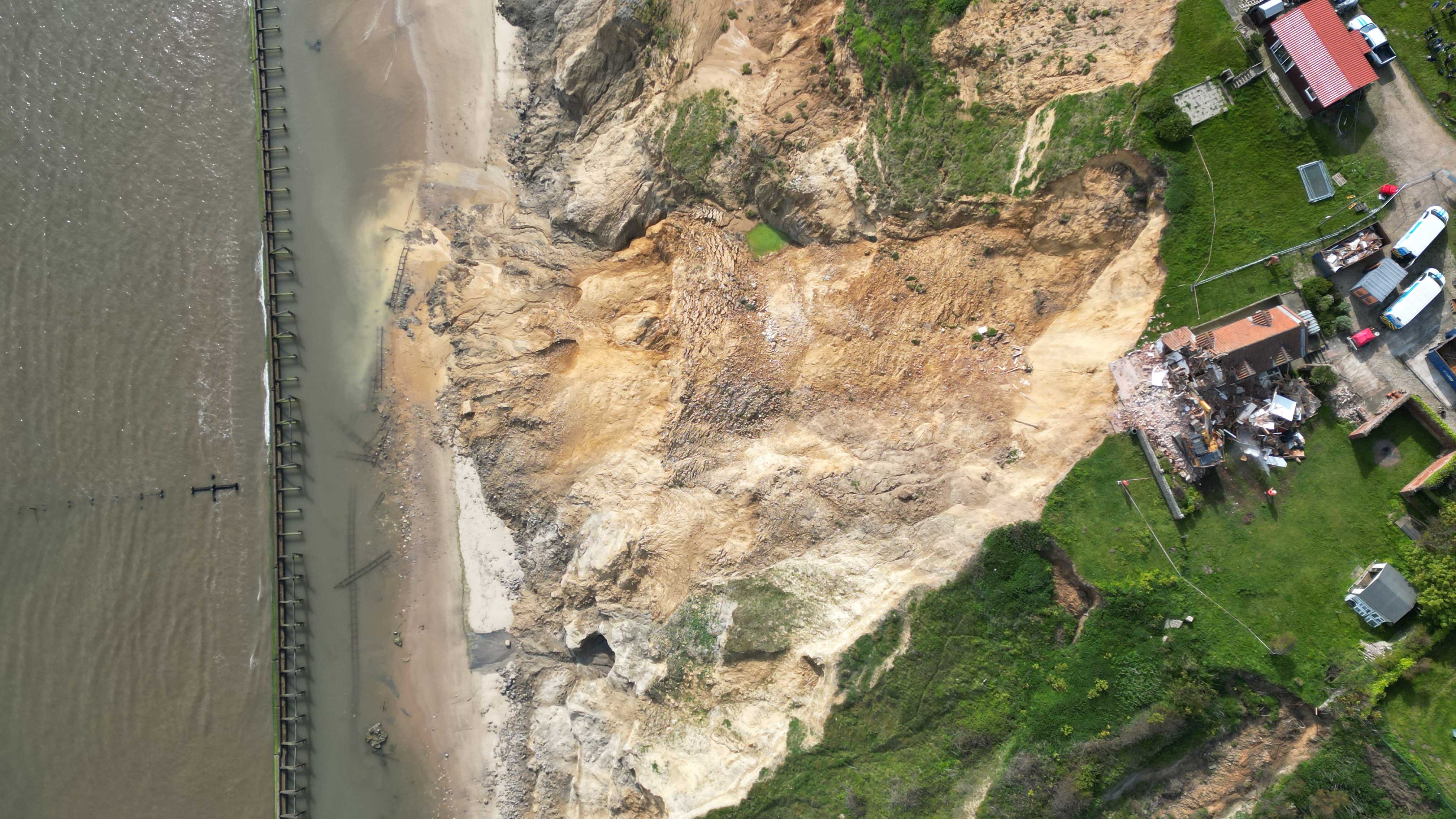 demolition of a property in Trimingham